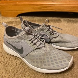 Women’s grey Nike sneaker